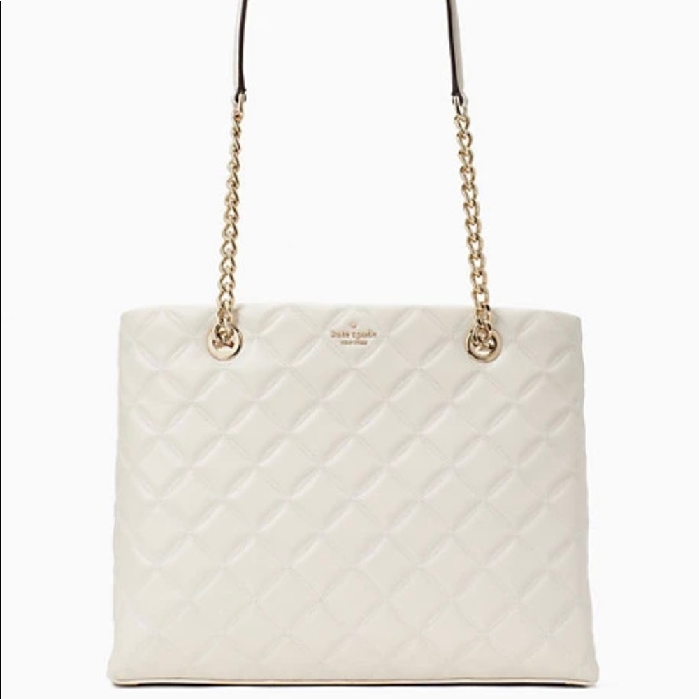 NWT Kate Spade tote. Parchment color with gold hardware.